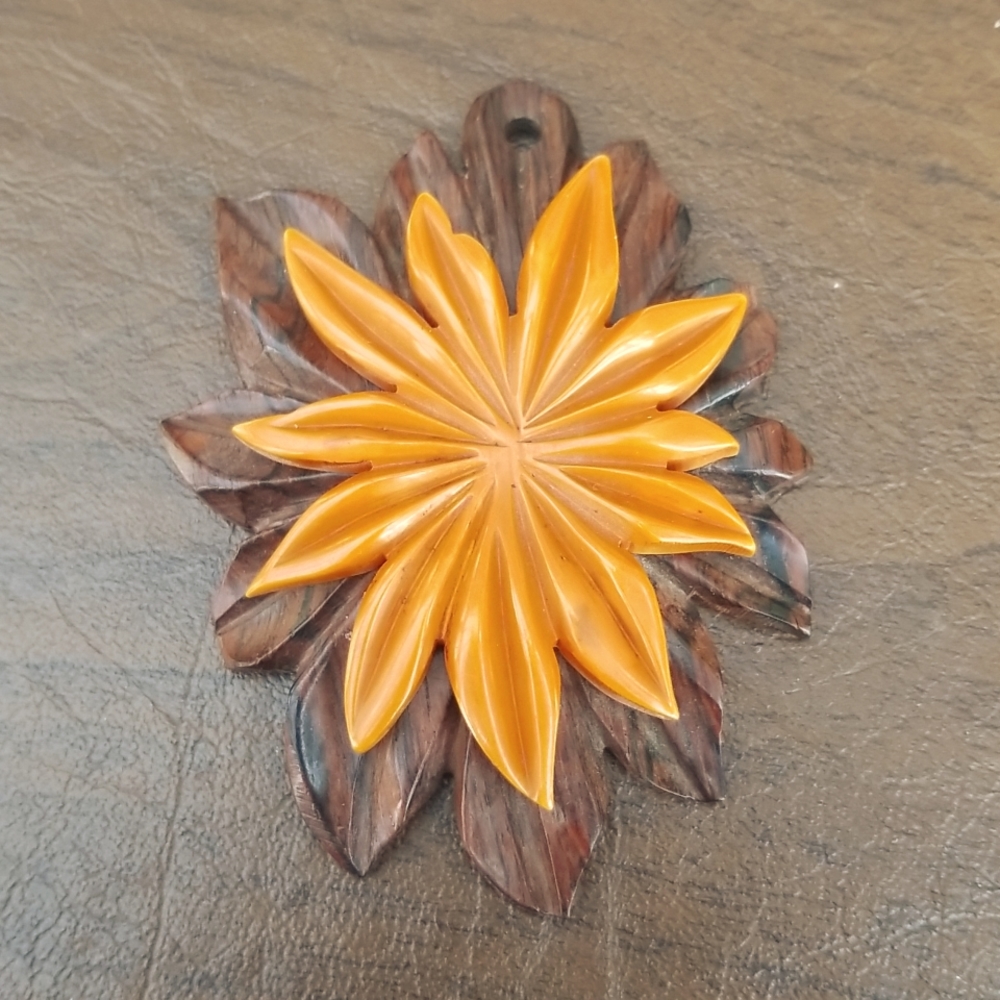 Vintage Bakelite Carved Floral Butterscotch Pendant on Carved Wood Back